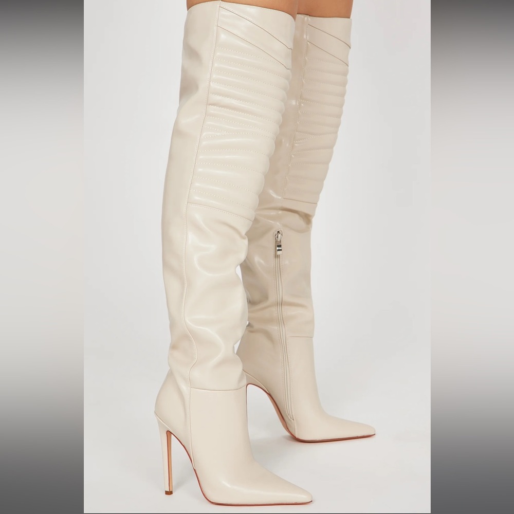 New cream knee high boots. Super sexy and a bit sporty.